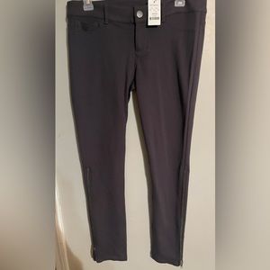 Women’s dark grey straight legged zipper Express pants.